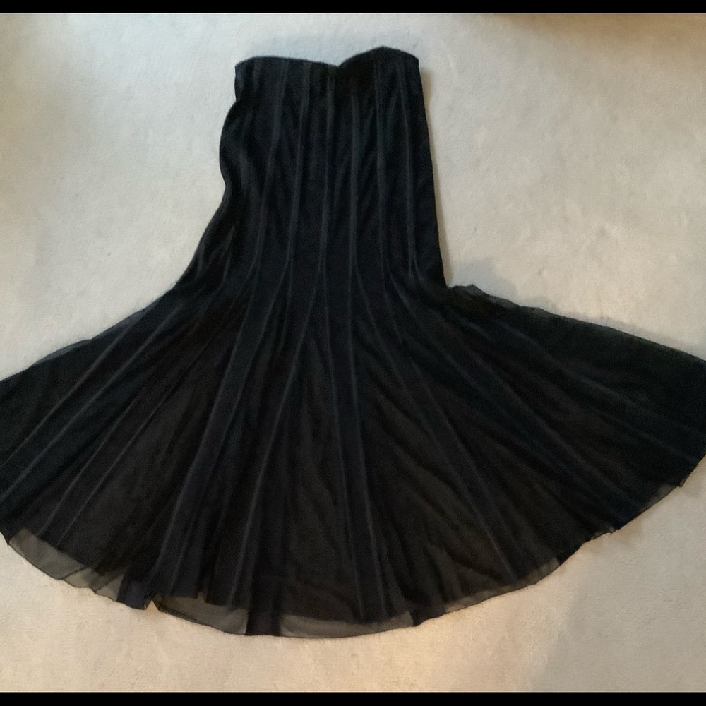 Black, flared bottom skirt